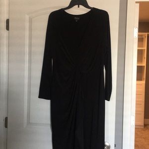 Longsleeve formal dress with front slit. V neck.